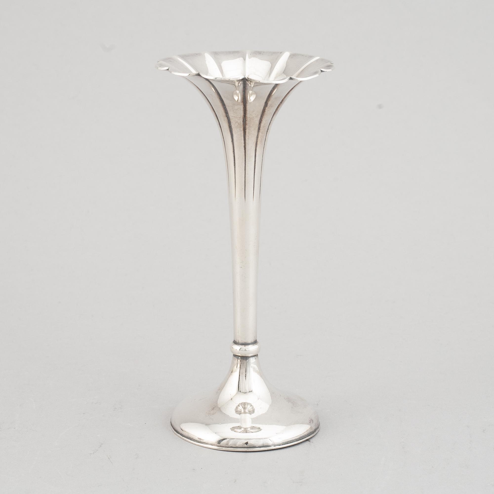 A group of four Japanese silver objects, mostly sterling, signed Yamakawa, Shokai Yokohama and Miyamoto, 20th century.