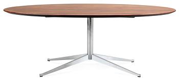 A Florence Knoll rosewood table on a chrome plated base, Knoll International, made on licence by NK, Sweden 1964.