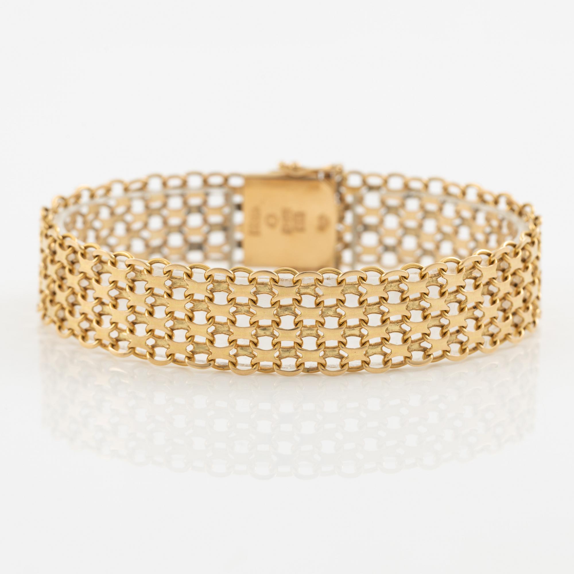 Arm bracelet, 18K gold, x-link.