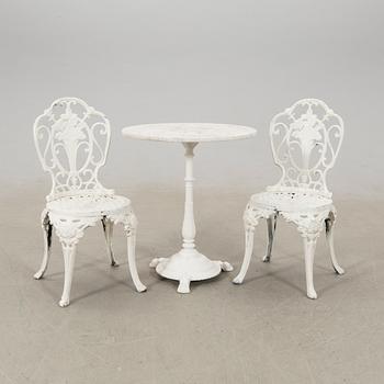 Garden table, Byarum late 20th century and chairs.