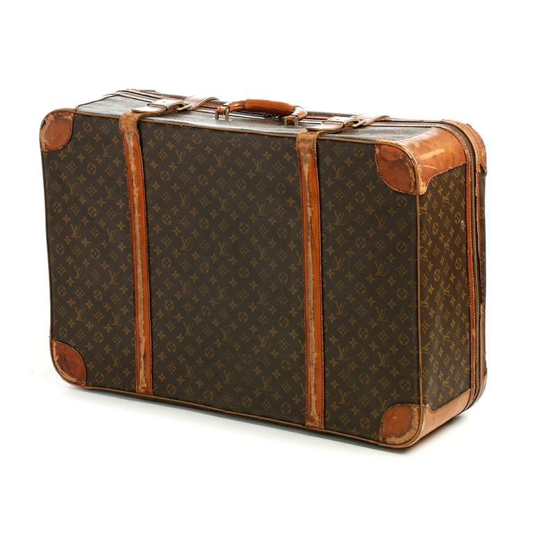 LOUIS VUITTON, a monogram canvas suitcase.
