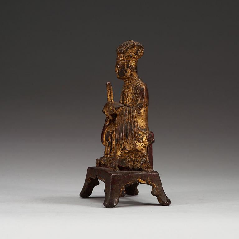 A brons figurine in the shape of The Jade Emperor, Yu Huang, late Ming dynasty (1368-1644).