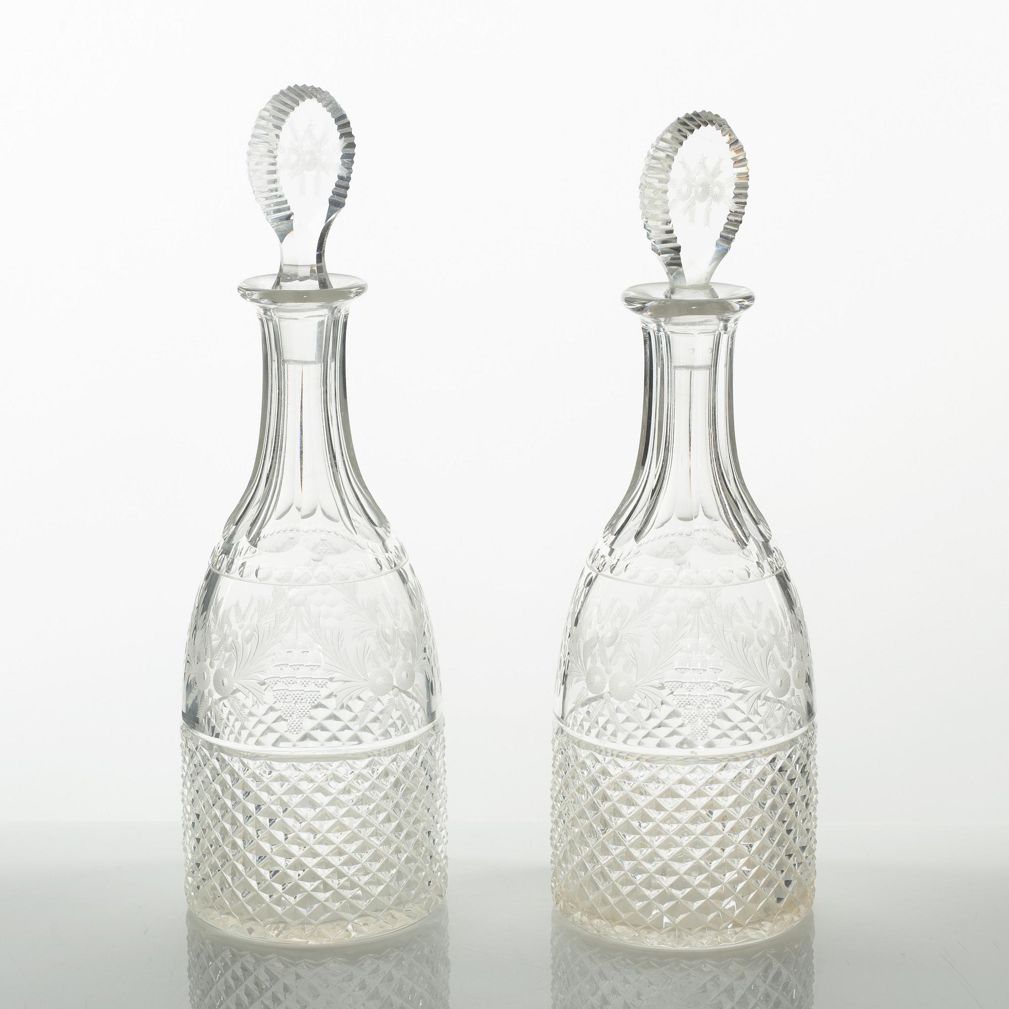Two glass decanters, around the year 1900.