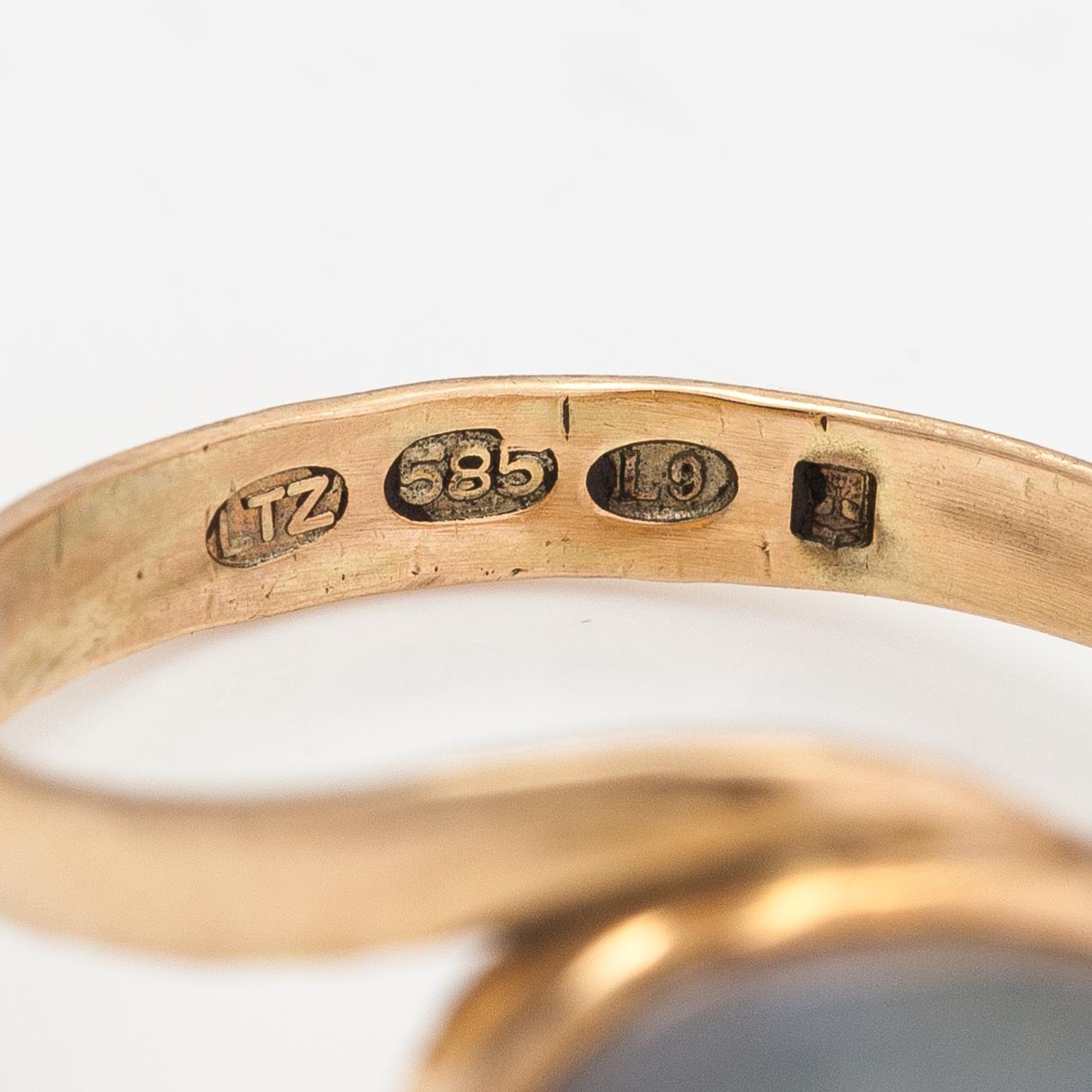 A 14K gold ring with an opal. Lagercrantz Jewellery, Tammisaari 2012.