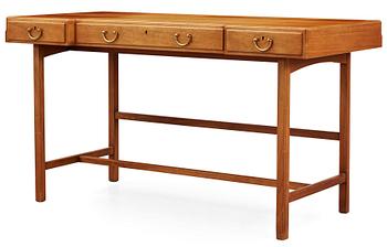 419. A Josef Frank mahogany and walnut desk by Svenskt Tenn.
