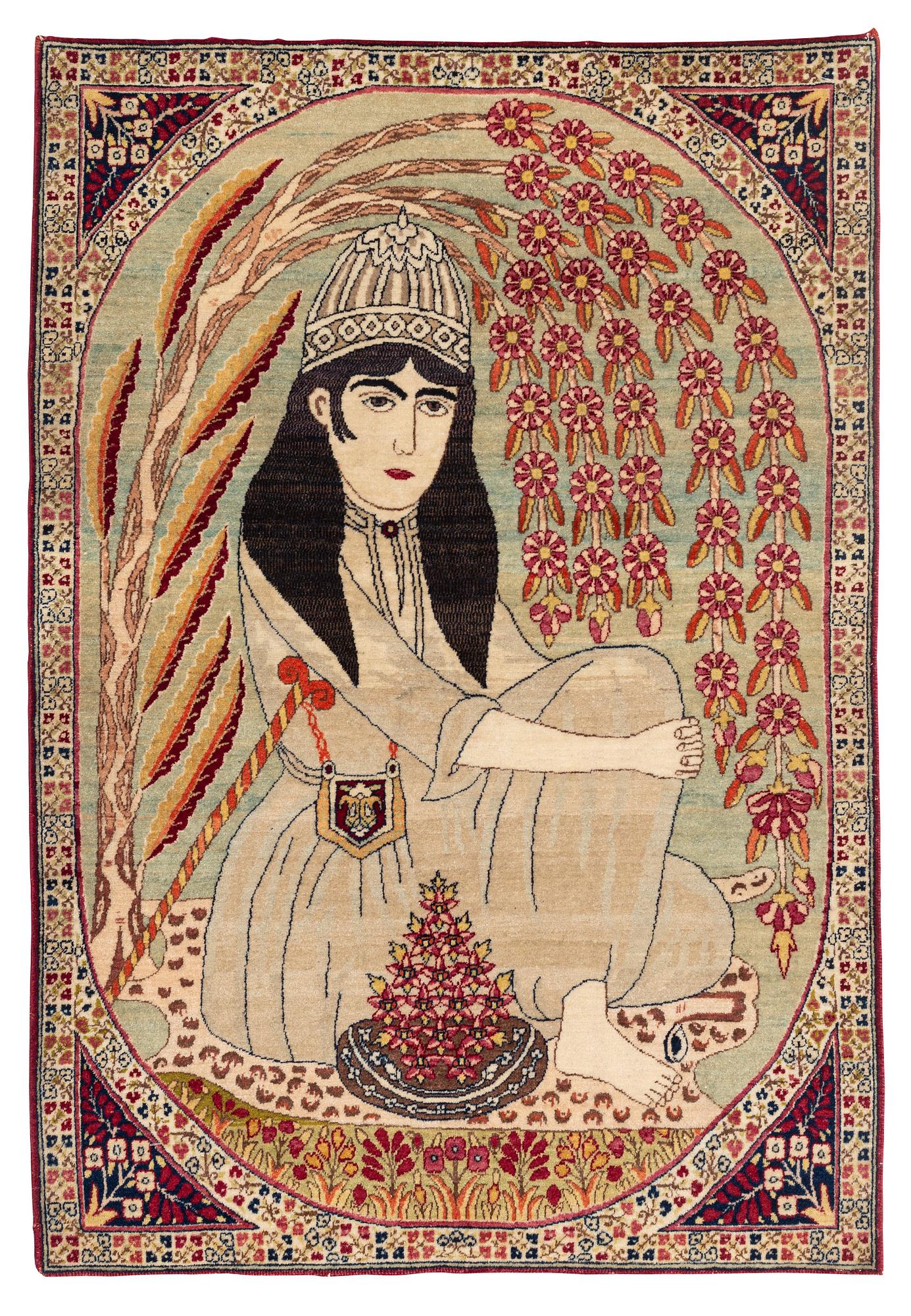 An antique pictorial Kirman Lavar, ca 98 x 67 cm.