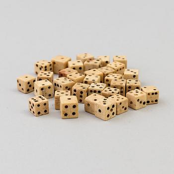 A COLLECTION OF 32 BONE MINIATURE DICE, 19th century.