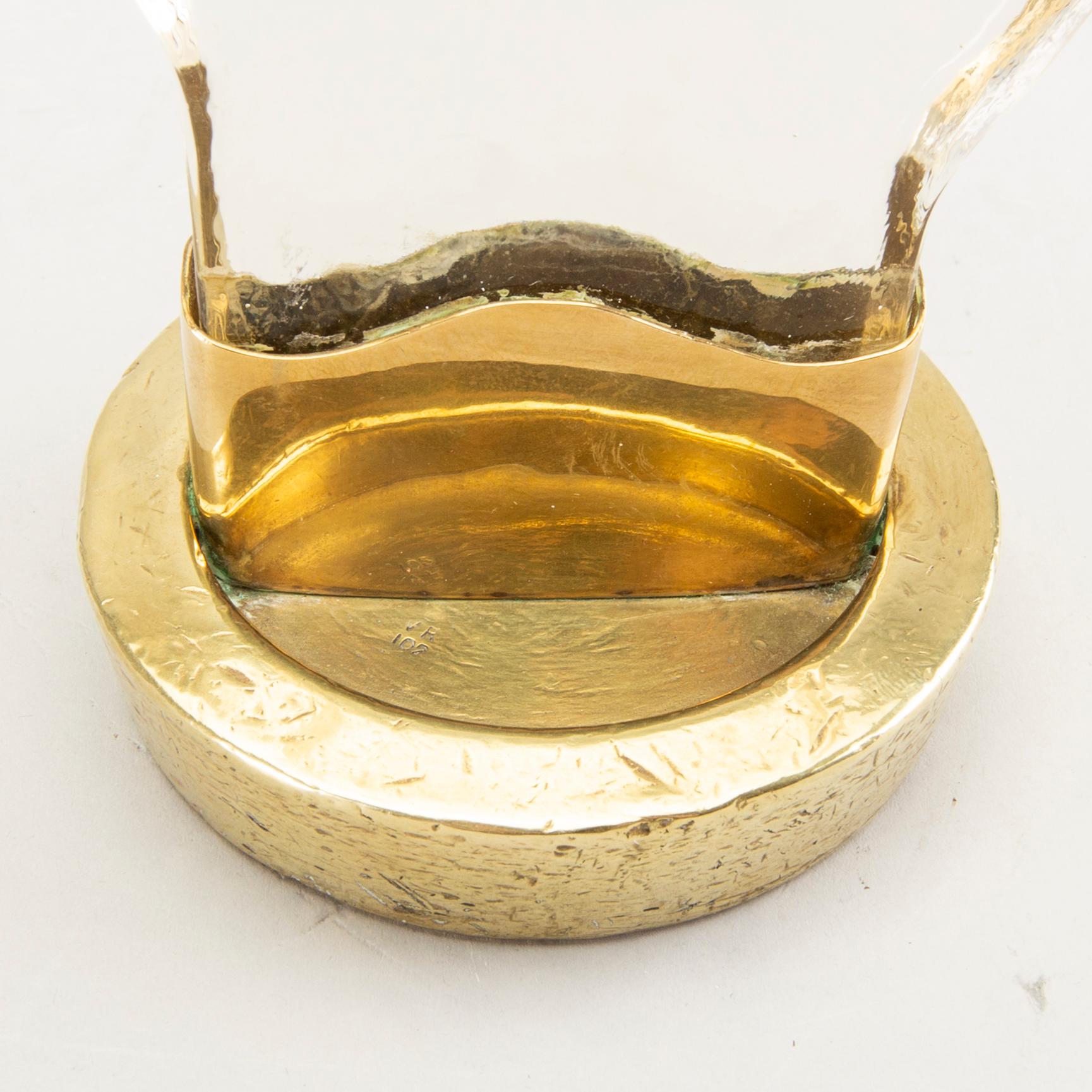 Estrid Ericson, attributed to, a brass and glass sculpture for exposing rings at Svenskt Tenn, 1950-1960s.