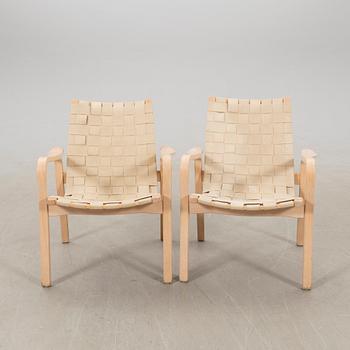 Yngve Ekström, a pair of "Primo" armchairs, Swedese Vaggeryd.