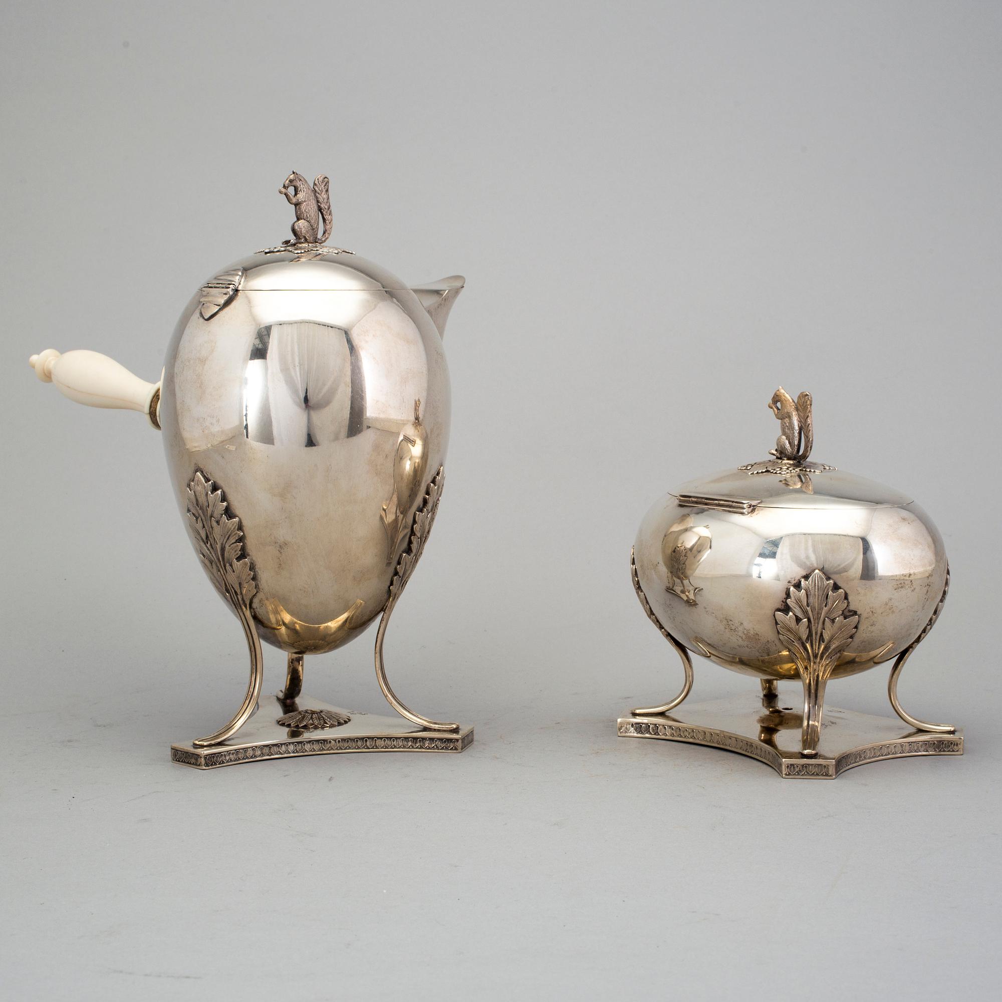 silver coffee pot with ivory handle and sugar bowl by CG Hallberg, Stockholm 1981 and 1920. Weight ca 1681 grams.