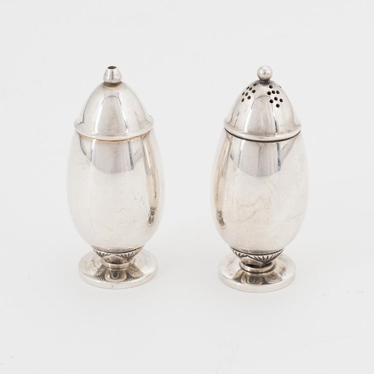 Gundorph Albertus, a pair of 'Cactus' sterling sugar casters from Georg Jensen, Denmark 1915-1927.