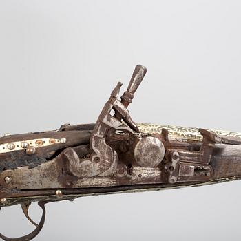 a 19/20th century musket, probably from north africa.