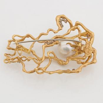 A cultured South Sea pearl and brilliant cut diamond brooch.