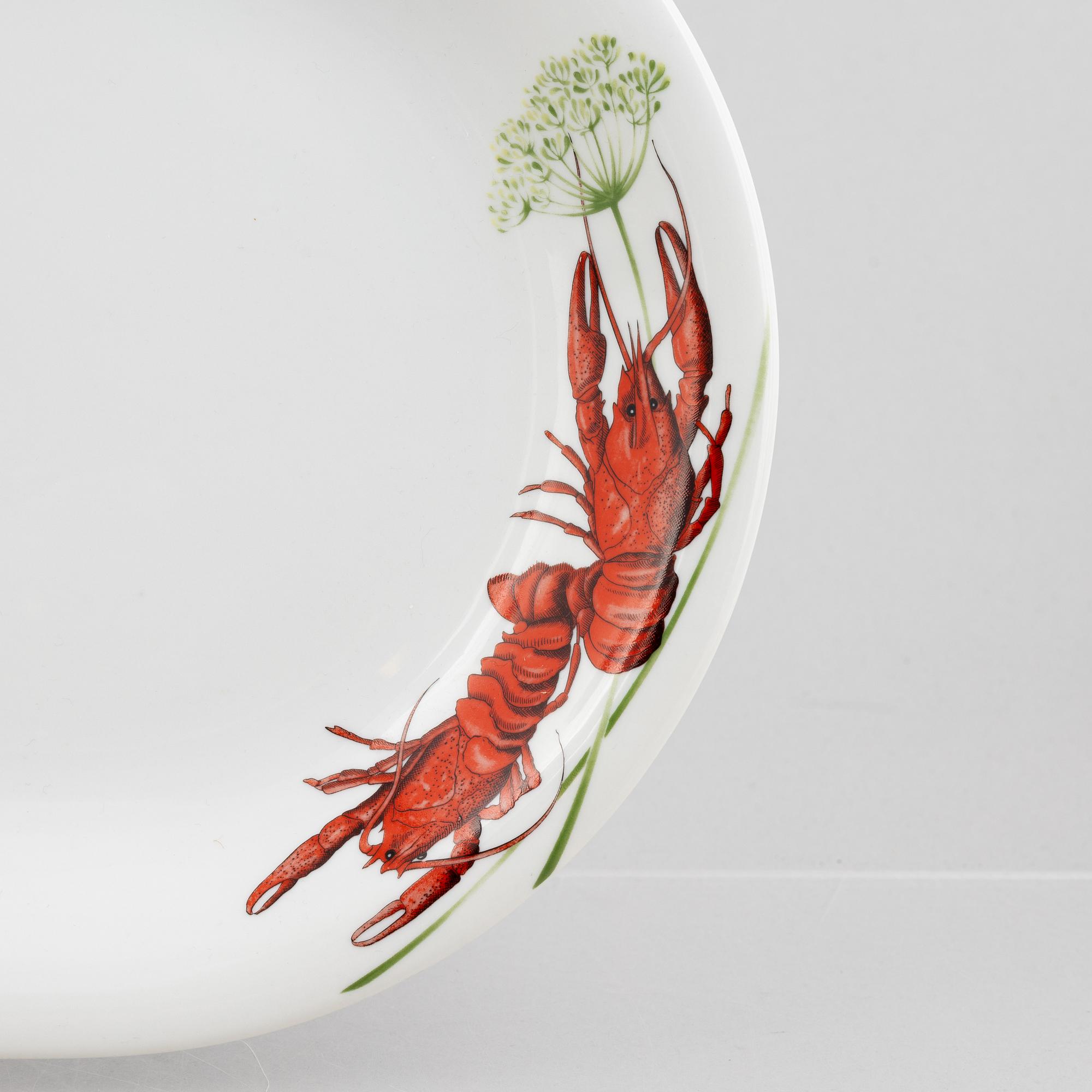 Six porcelain crayfish plates and a serving platter, Rörstrand, Sweden, late 20th century.