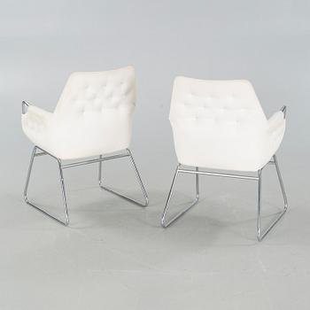 A pair of armchairs, designed by Bruno Mathsson International, around year 2000.