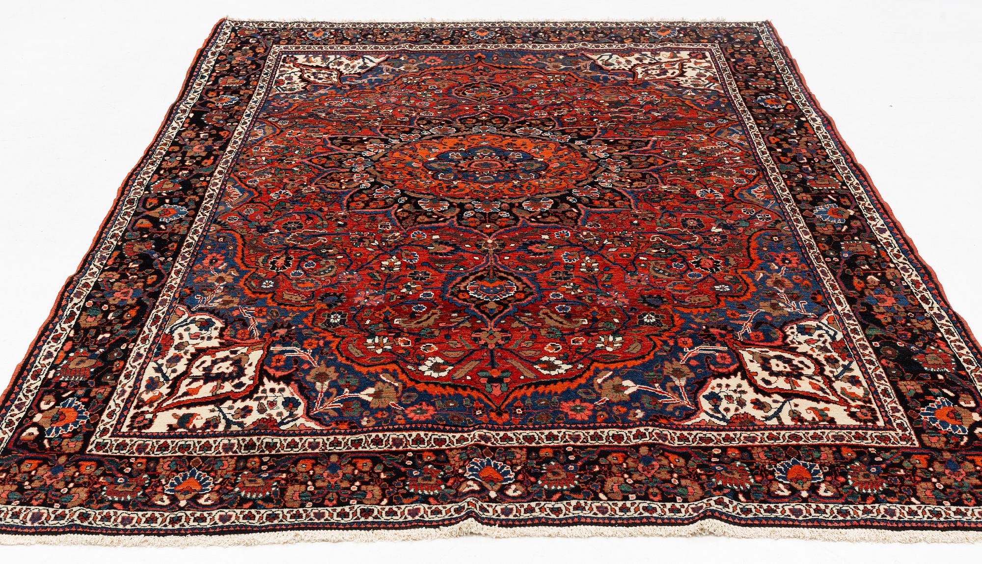 A semi-antique Abadeh carpet, approximately 296 x 191-196 cm.