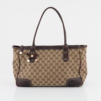 Gucci, a monogram canvas handbag.