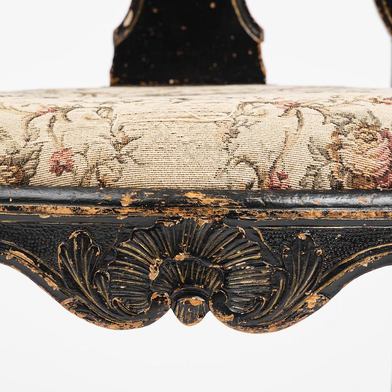 A pair of rococo armchairs in the manner of C. M. Sandberg, later part 18th century.