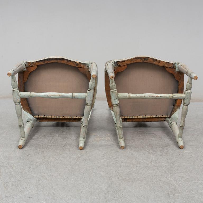 A pair of Gustavian late 18th century chairs.