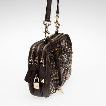 LAUKKU, "Studded Glam Lily", Dolce & Gabbana.