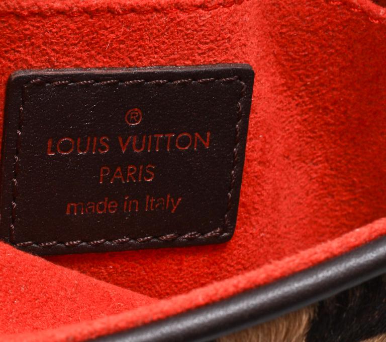 VÄSKA, "Damier Sauvage Gazelle Pochette", Louis Vuitton.