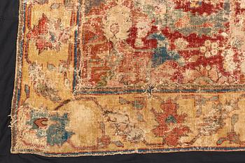 A carpet, antique, 17th century North east Safavid persia "Blossom and sickle", ca 311 x 156 cm.