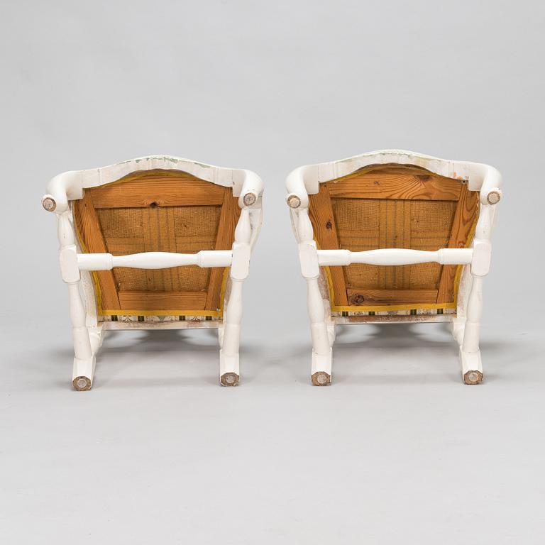 A pair of Rococo style armchairs, a pair of chairs, and a table, mid 20th century.