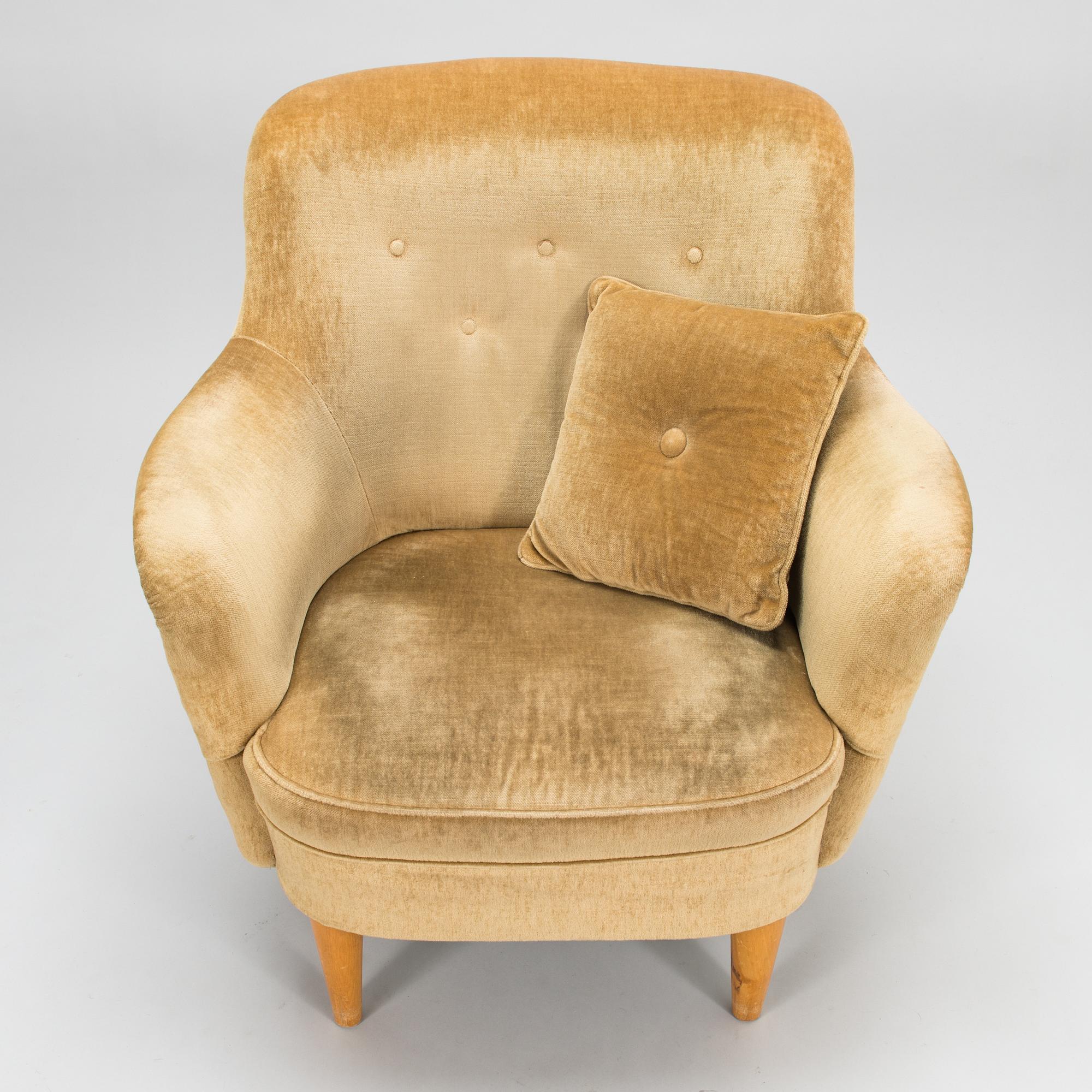 A mid-20th-century sofa and armchair.