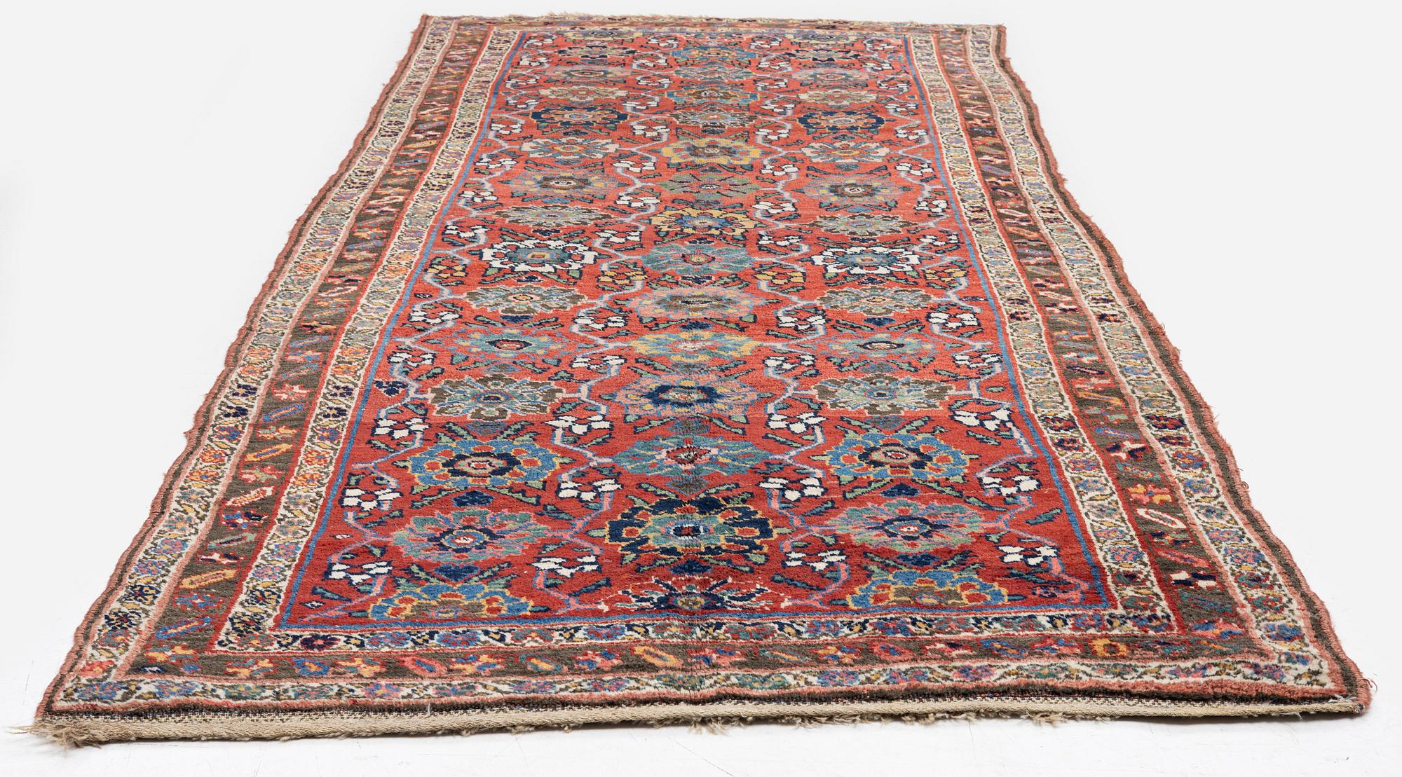 An antique Bidjar carpet, West Persia, c. 352 x 148 cm.