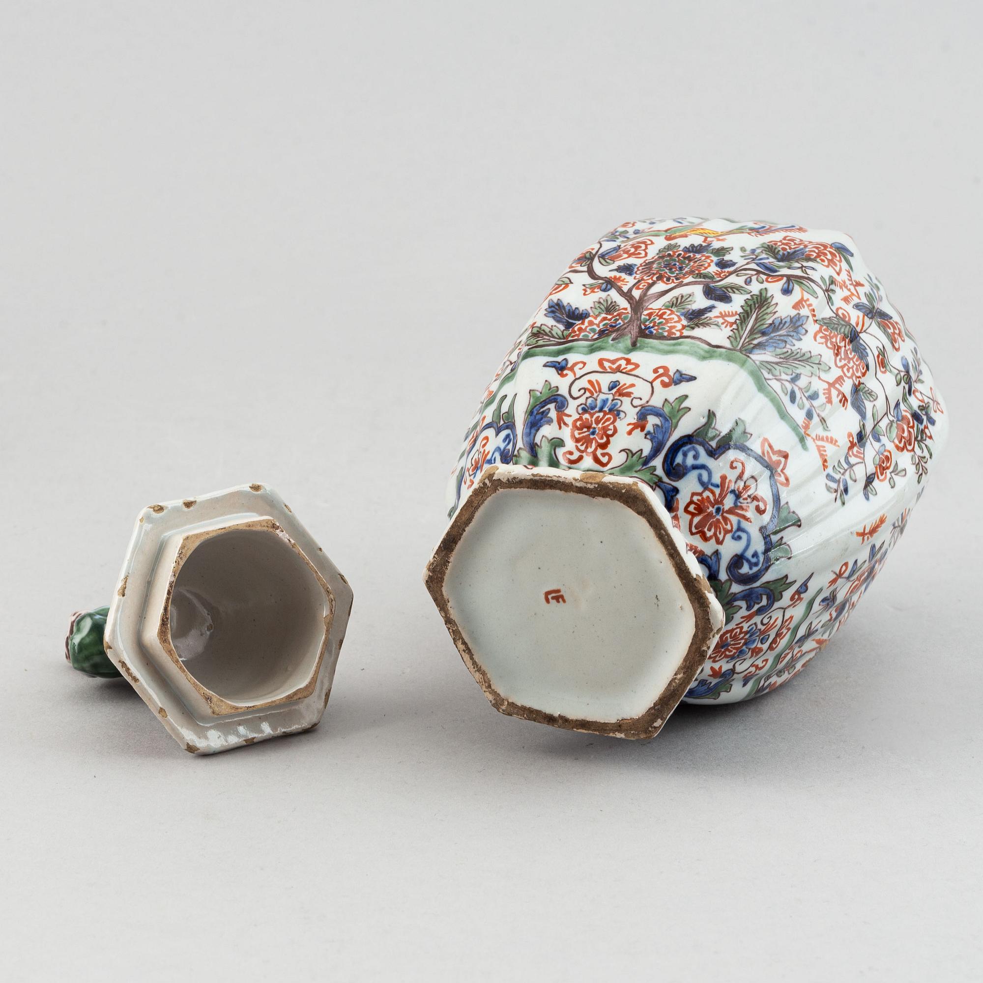 A five piece french faience garniture.