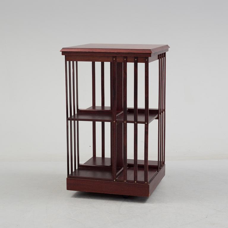 An second half of the 20th century turning book shelf veneered with mahogny.