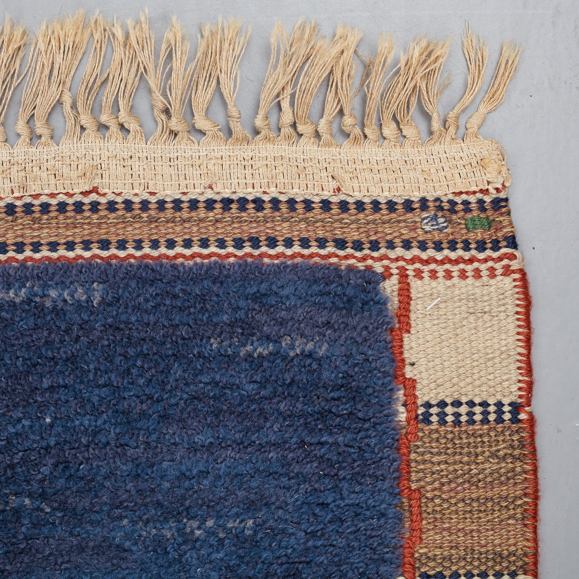 Märta Måås-Fjetterström, A CARPET, "Rutig blå halvflossa", knotted pile in relief, ca 304 x 209,5 cm, signed AB MMF.