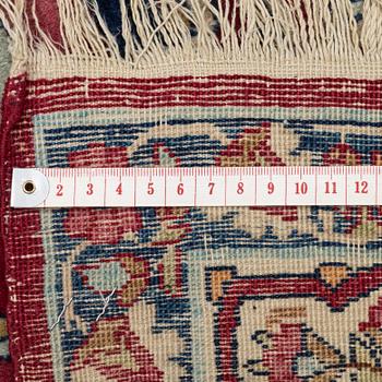 An antique Kerman Raver rug, ca 225 x 141 cm.
