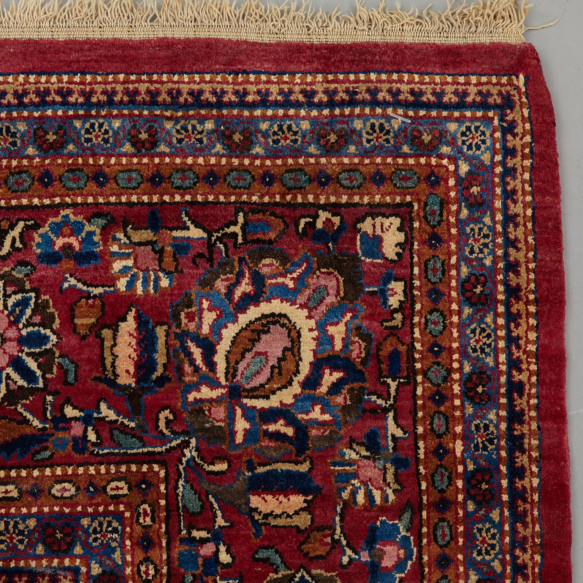 A RUG, semi-antique silk Kashan, ca 200 x 129 cm.