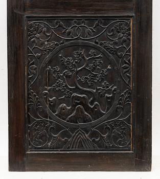 A Chinese wooden panel, Qing dynasty, 19th century.