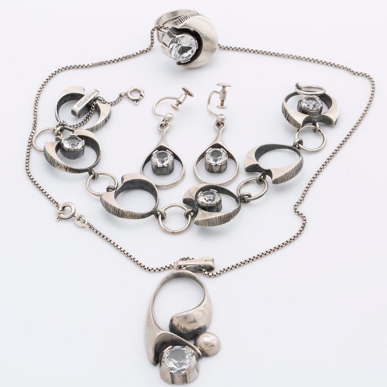 KARL LAINE, silver jewelry, 4 pieces with rock crystal, Finland, 1970s.