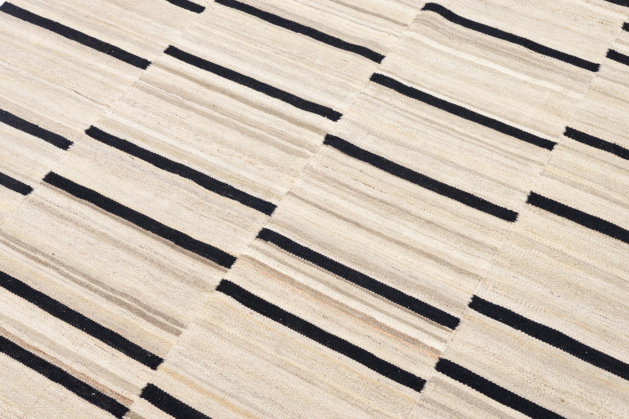 A Kelim rug, c. 195 x 162 cm.