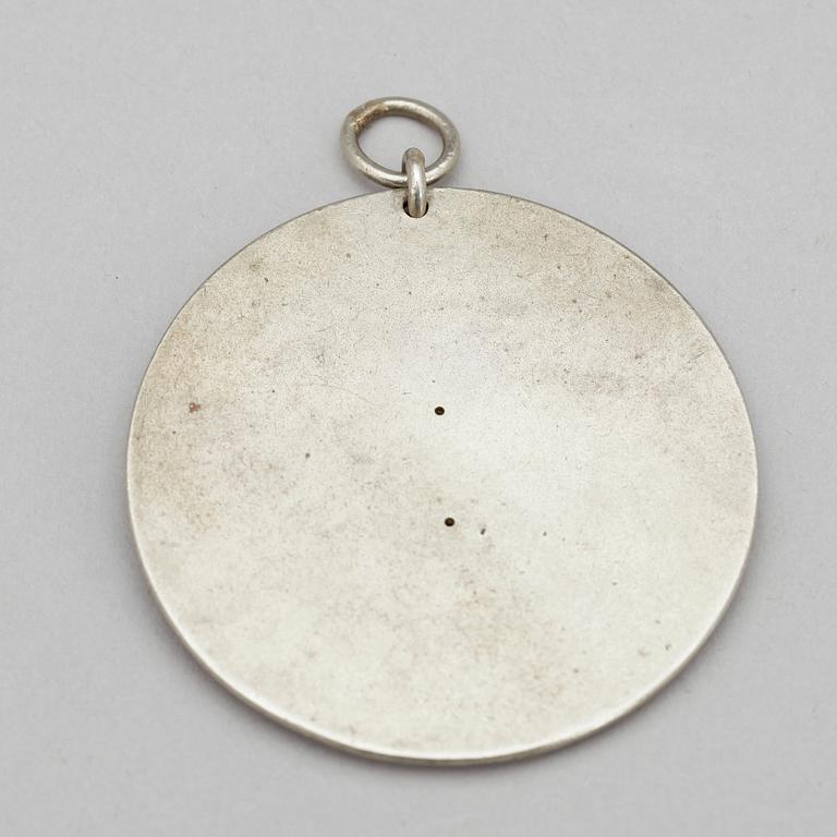 POLISBRICKA, vitmetall, Norrköping.