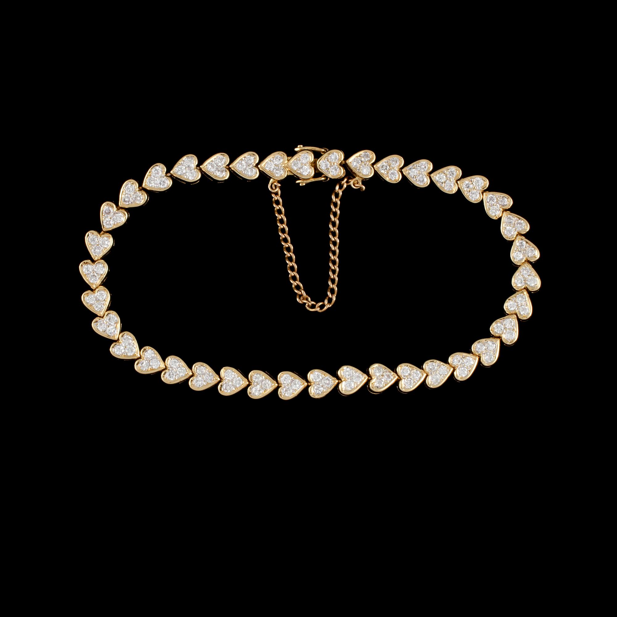 ARMBAND, 18k guld med briljantslipade diamanter totalt ca 2.85 ct. Vikt 15 g.