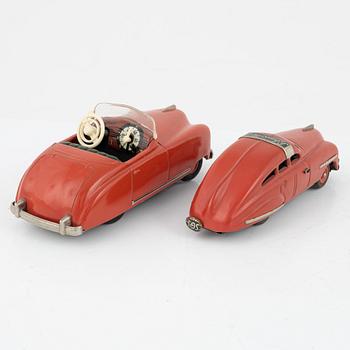 A set of eight toy cars, mostly Schuco, 20th century.