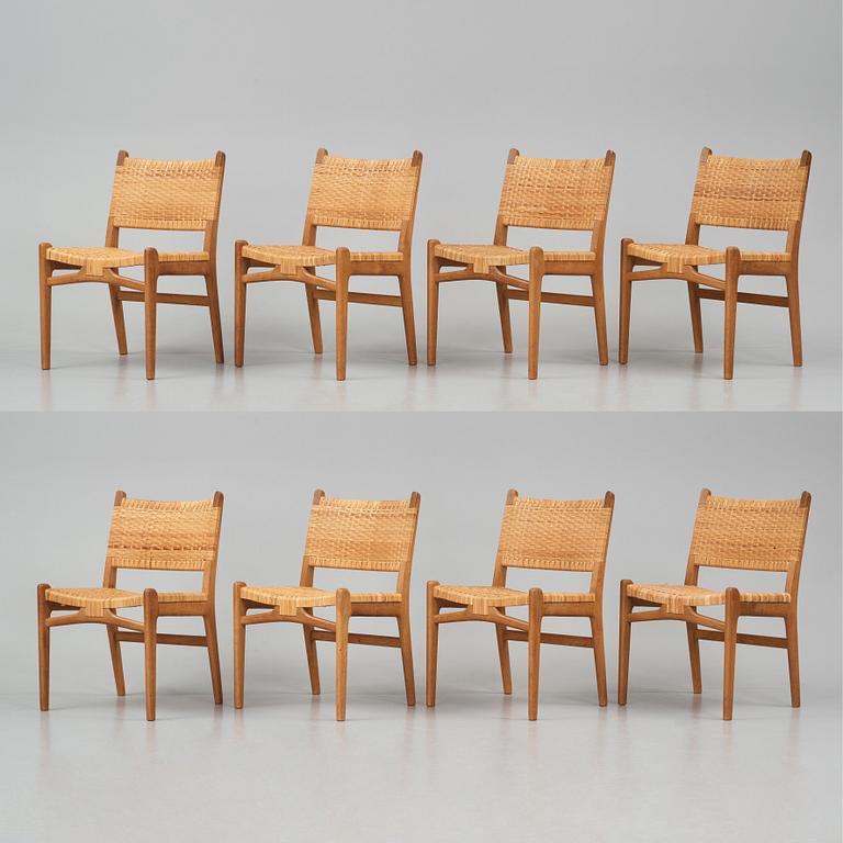 Hans J. Wegner, a set of eight "CH31" oak and rattan chairs, Carl Hansen & Son, Denmark 1950s.