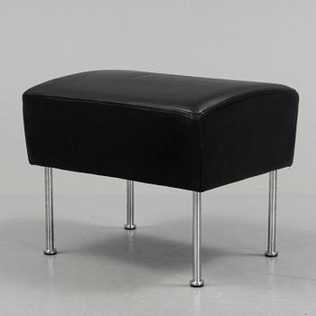 A "Cinema" footstool by Gunilla Allard.