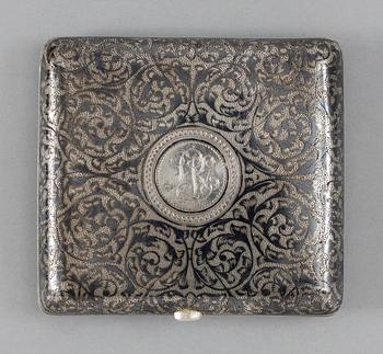 A RUSSIAN PARCEL-GILT AND NIELLO CIGARETTE-CASE, makers mark possibly of Gustav Klingert, Moscow 1888.