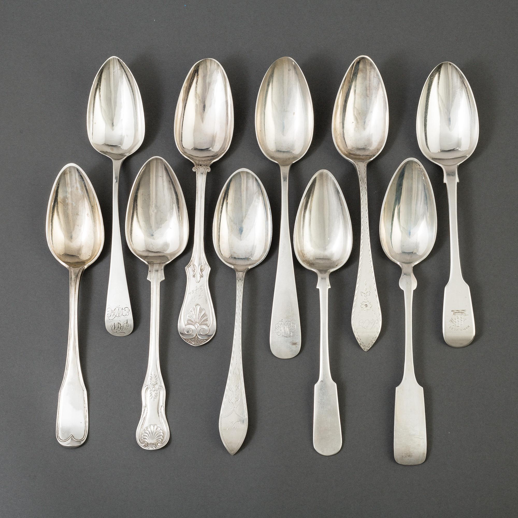 A set of 10 different spoons of different nationalities.