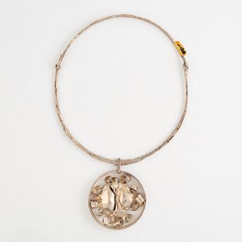 Lars Arby, three neck rings with pendants, silver, Gothenburg including 1977, 1978, and 1982.