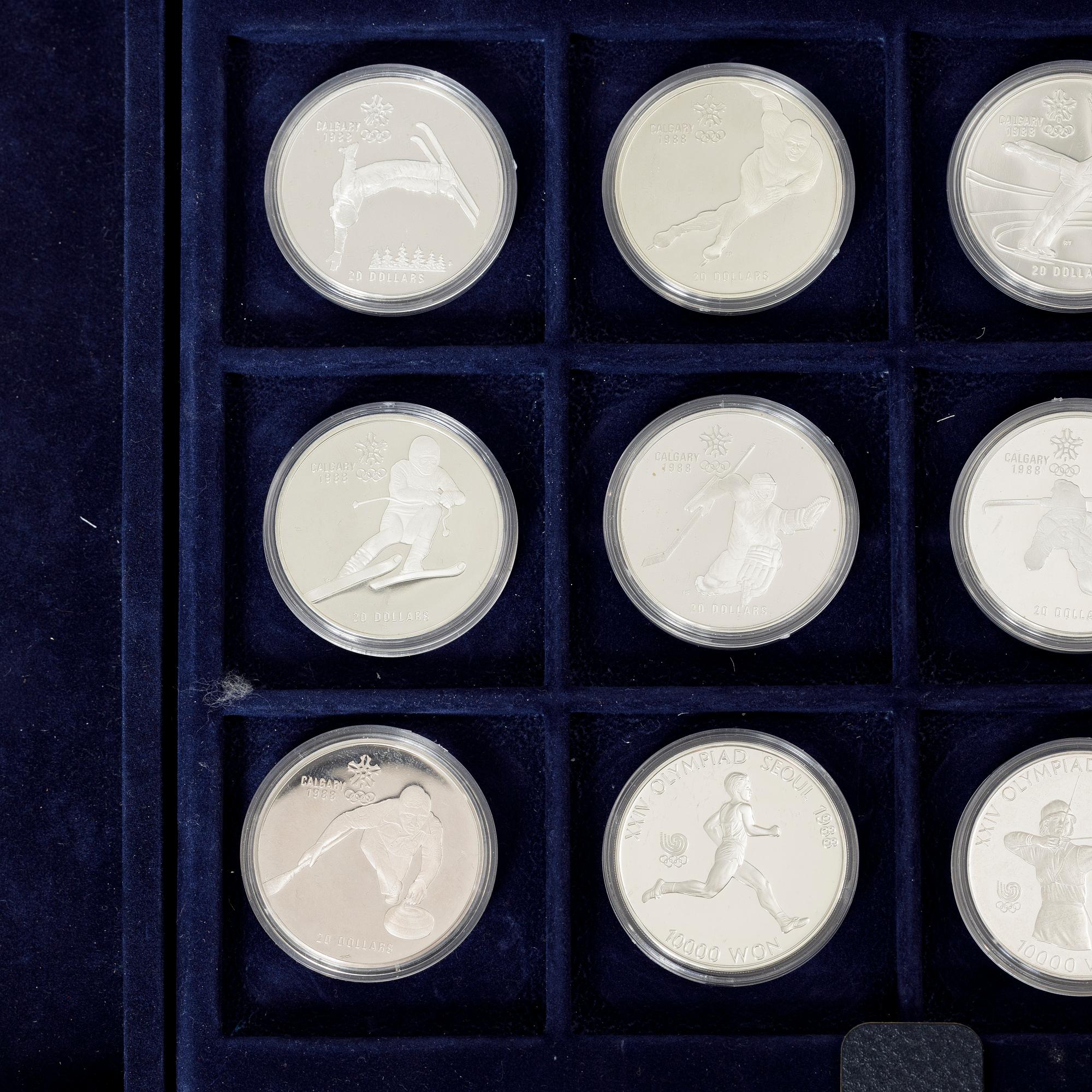Twelve commemorative sterling silver coins, Olympic Games, Calgary and Seoul, 1988.
