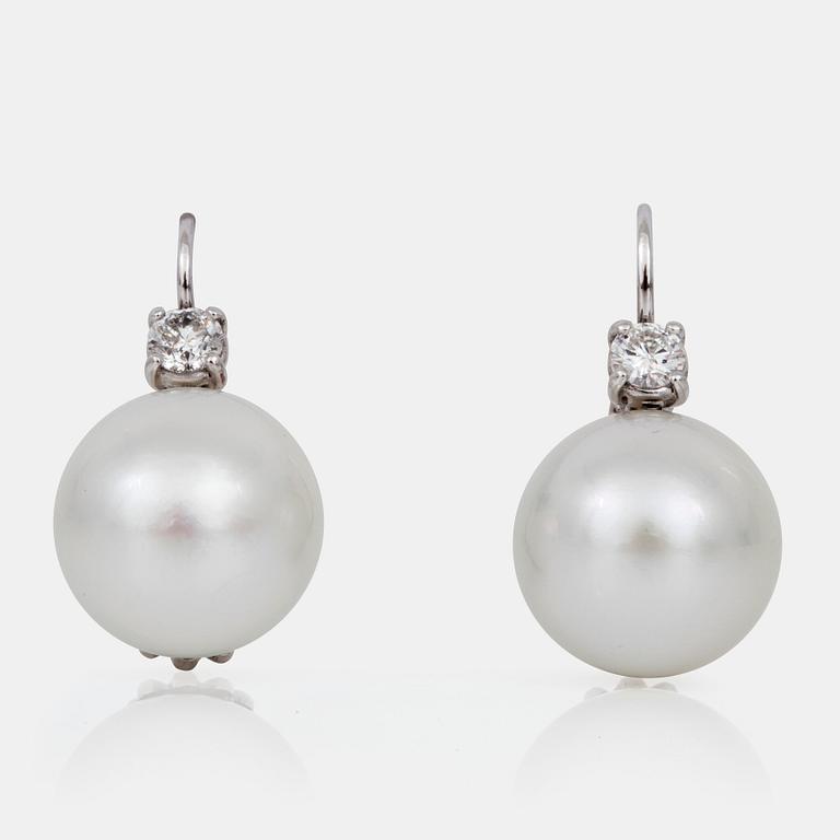 A pair of cultured South Sea, Ø 16mm, and diamond, circa 0.70 ct in total, earrings.