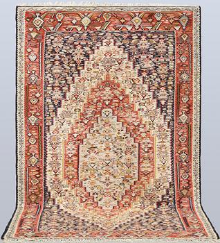 A semi-antique Kilim rug, Senneh, c. 230 x 147 cm.