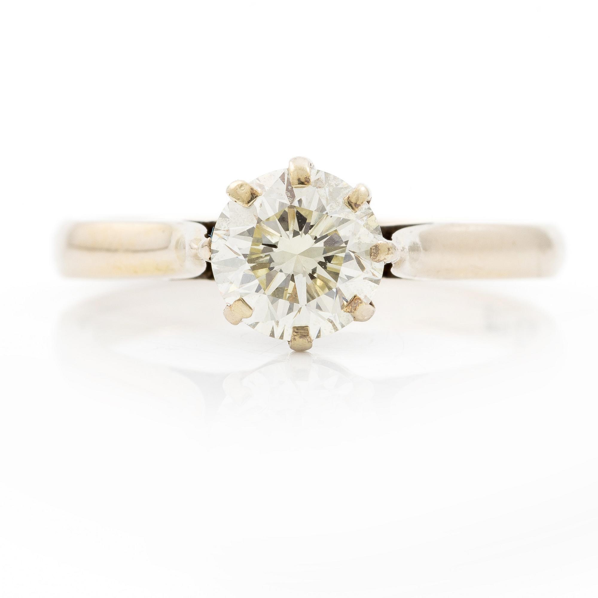 Ring, 18K white gold with brilliant-cut diamond.