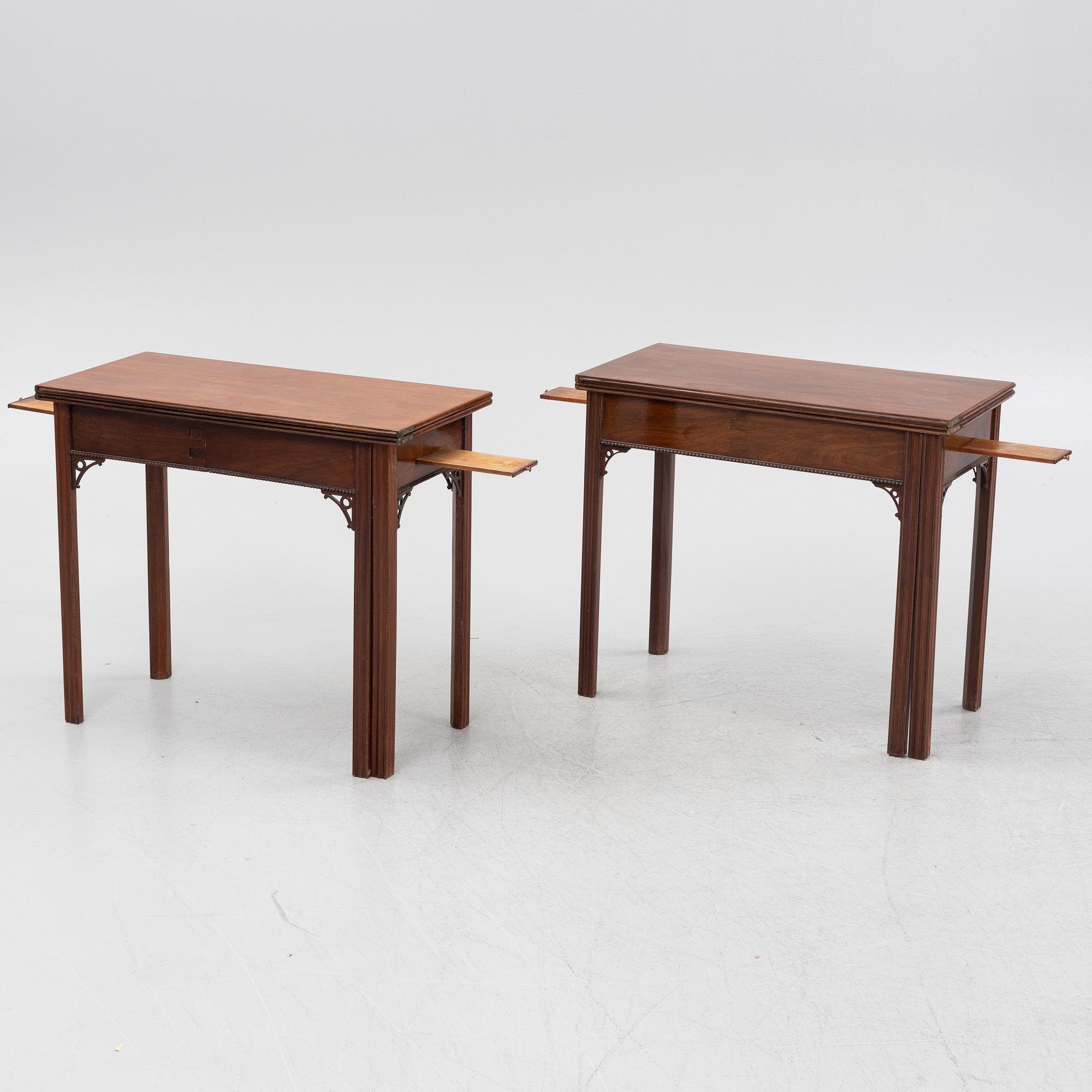 A macthed pair of late Gustavian mahogany veneered card tables one by C D Fick, Stockholm 1776-1806.
